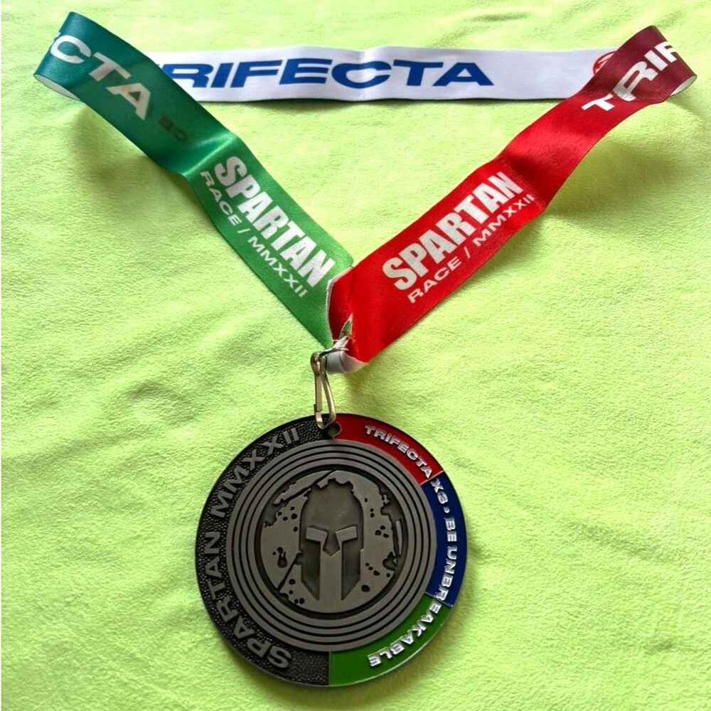 Official Spartan Race 2022 Multi-Trifecta X3 finisher medal (MMXXII).